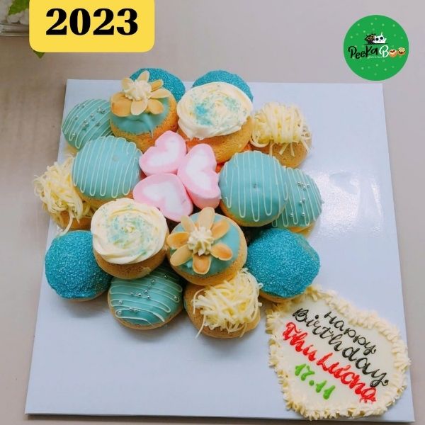 Mẫu bánh su kem xanh dương 2 lớp tặng bé trai dịp sinh nhật - 2023 1 Happy (25)
